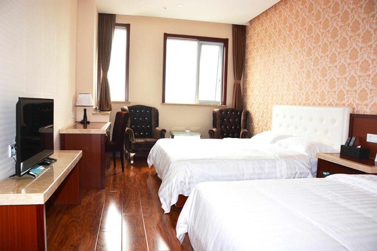 Qingdao Hua Qi Kaiserdom Hotel Esterno foto