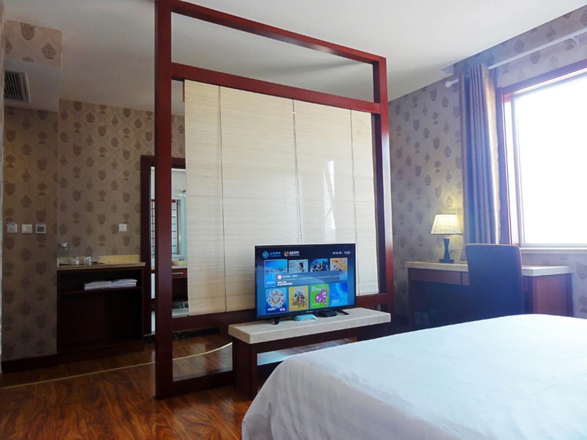 Hua Qi Kaiserdom Hotel Zhongshan Road St Michael'S Cathedral And Zhanqiao Pier Qingdao Esterno foto